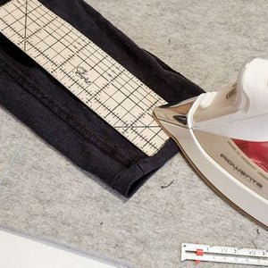 Save time and achieve precise hems effortlessly with the 10-inch long Hot Hem Ruler. Simply fold your fabric using the grids and press with confidence, covering seam allowances from 1 inch to 2 ½ inches, or even 10 inches when turned. This ironing ruler streamlines your sewing preparation for enhanced convenience.