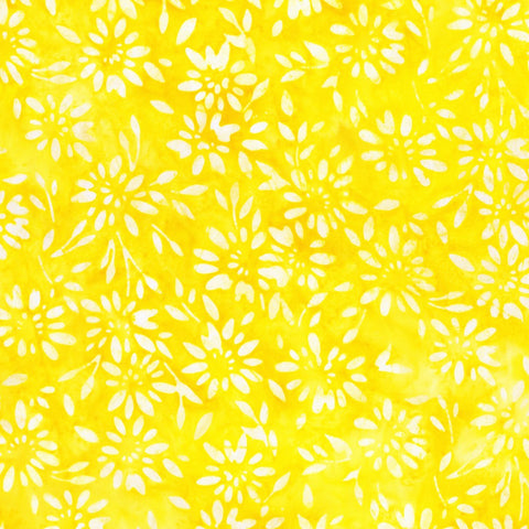 This fabric from Robert Kaufman is a bright yellow batik with bursts all over. This yellow ranges from a golden yellow to a light lemon yellow.&nbsp;