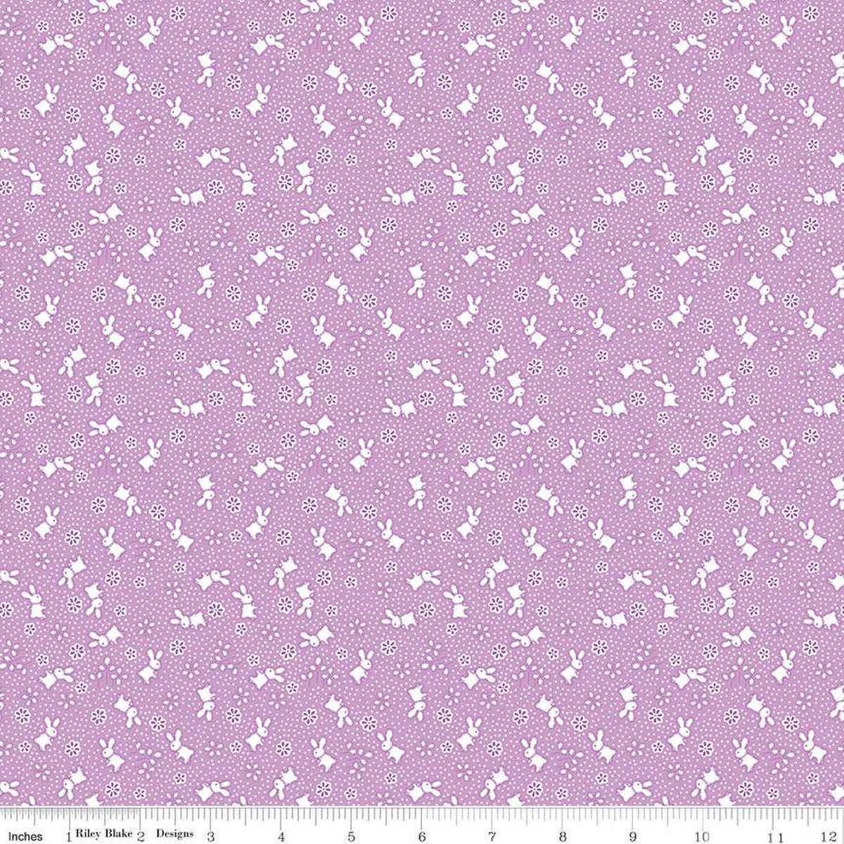 Storytime 30s by the RBD Designers for Riley Blake Designs is great for quilting, apparel and home decor. This print features bunnies, blossoms, and pin dots. Violet color background with white accents.&nbsp;