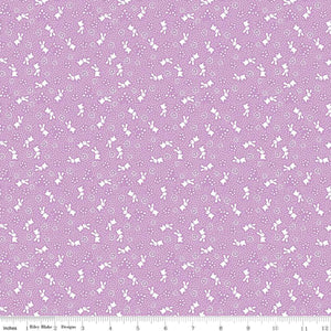 Storytime 30s by the RBD Designers for Riley Blake Designs is great for quilting, apparel and home decor. This print features bunnies, blossoms, and pin dots. Violet color background with white accents.&nbsp;