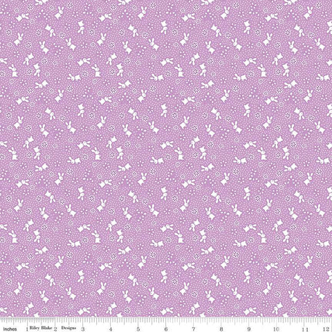 Storytime 30s by the RBD Designers for Riley Blake Designs is great for quilting, apparel and home decor. This print features bunnies, blossoms, and pin dots. Violet color background with white accents.&nbsp;