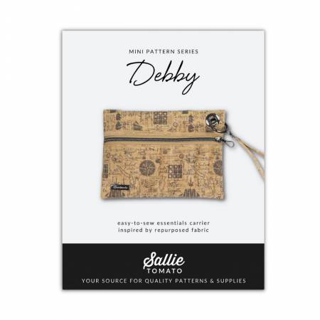 Debby is an essential carrier made to grab and go! Debby is a quick project that is great inside of a bigger bag or perfect on it's own. The concept of Debby was created by Debby Bellamy, Jamie's mother, who is an avid sailor. The original samples were made from the salvaged remnants of her sailboat sail!