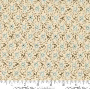 This fabric is from Moda and was designed by Betsy Chutchain. This fabric has a light yellow/ivory background with small blue flowers and tiny brown flowers. Small scale print.&nbsp;