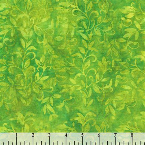 This batik is a bright green with leaves all over. Yellow, lime green and darker green all throughout this fabric.&nbsp;