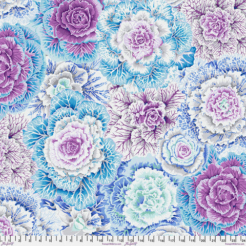 This bright fabric is from Kaffe Fassett and is full of blues, purples, greens, greys, and whites. 