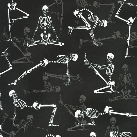 This fabric is covered in skeletons doing yoga. This fabric also glows in the dark! 