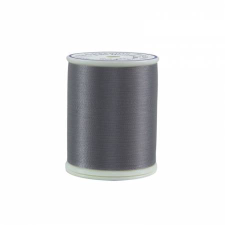 60 wt. 2-ply polyester thread. Designed for applique, bobbin thread, and quilting. Lint-free never felt so good. The Bottom Line makes a fantastic bobbin thread for any type of sewing. Its lightweight, blending colors are easily matched with any top thread. Available in 55 colors. Invisible applique and binding is a breeze with Bottom Line as it glides through layers of fabric. Bottom Line is fantastic for micro-stippling and English Paper Piecing.