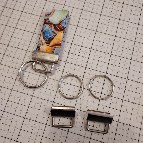 Keychain hardware with key ring - Easy application, just use plyers! Creates two keychains. 1" size