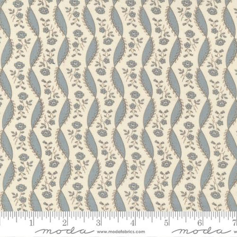 This fabric is covered in traditional little blue flowers with blue ribbon vertical stripes. This design is over an ivory background. 