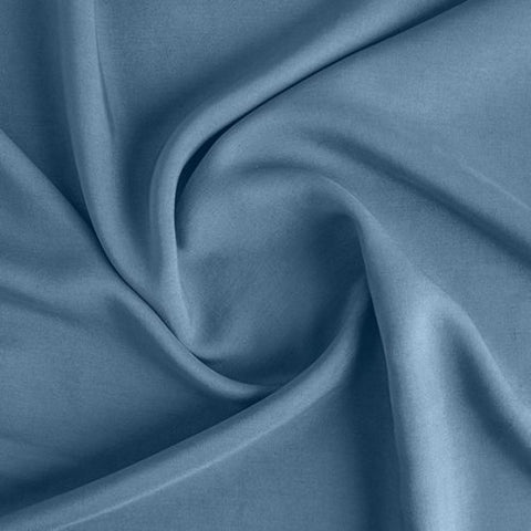 Dusty blue rayon, has a beautiful drape and hand. Perfect rayon to compliment any batik. 100% rayon, 45"