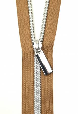 #5 Zippers by the Yard contain 3 yards of Magnolia Zipper tape with Gunmetal Teeth and 9 matching pulls. Coordinate the zipper tape color with your fabric and match the zipper teeth color with your purse hardware! Easily cut and sew through the nylon teeth while achieving the appearance of metal teeth.